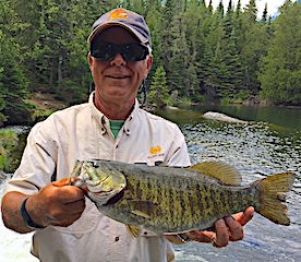 Trophy Fishing Smallmouth Bass by Jim at Fireside Lodge in Canada